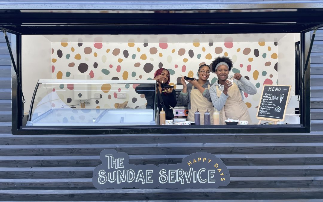 Ella, Hannah and Zara pose with waffles and ice cream from Maya the kiosk pod at Frank's Farm